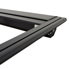Load image into Gallery viewer, Westin 24-26 Toyota Tacoma 5ft Bed Manual Retractable Tonneau Cover - Black