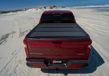 Load image into Gallery viewer, BAK 2022 Nissan Frontier 5ft Bed BAKFlip MX4 Matte Finish - Corvette Realm