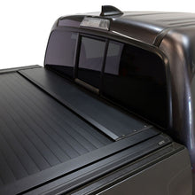 Load image into Gallery viewer, Westin 16-23 Toyota Tacoma 5ft 5in Bed Manual Retractable Tonneau Cover - Black