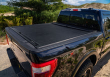 Load image into Gallery viewer, Roll-N-Lock 2024 Toyota Tacoma 5ft M-Series Retractable Tonneau Cover