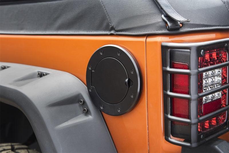 Rugged Ridge Non-Locking Gas Cap Door Black 07-18 Jeep Wrangler - Corvette Realm