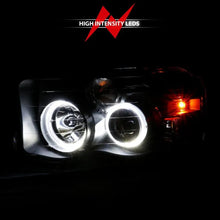 Load image into Gallery viewer, ANZO 2002-2005 Dodge Ram 1500 Projector Headlights w/ Halo Black Clear Amber - Corvette Realm