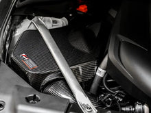 Load image into Gallery viewer, AWE Tuning 2020+ Toyota GR Supra S-FLO Carbon Intake Lid - Corvette Realm