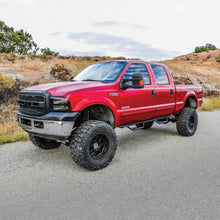Load image into Gallery viewer, Westin 1999-2016 Ford F-250/F-350/F-450/F-550 Crew Cab Outlaw Drop Nerf Step Bars Textured Black