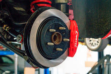 Load image into Gallery viewer, BMR 10-15 Chevrolet Camaro 15in Conversion Kit w/ Solid Rotors &amp; Red Calipers