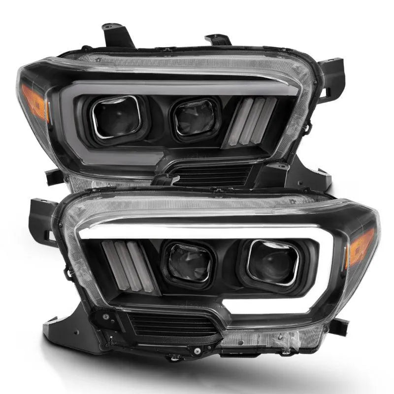 ANZO 2016-2017 Toyota Tacoma Projector Headlights w/ Plank Style Switchback Black w/ Amber - Corvette Realm