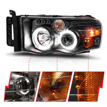 Load image into Gallery viewer, ANZO 2002-2005 Dodge Ram 1500 Projector Headlights w/ Halo Black Clear Amber - Corvette Realm