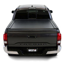 Load image into Gallery viewer, Westin 16-23 Toyota Tacoma 5ft 5in Bed Manual Retractable Tonneau Cover - Black