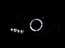 Load image into Gallery viewer, ANZO 1994-2001 Dodge Ram Projector Headlights w/ Halo Black - Corvette Realm