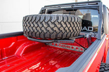 Load image into Gallery viewer, DV8 Offroad 2019+ Jeep Gladiator In-Bed Adjustable Tire Carrier - Corvette Realm