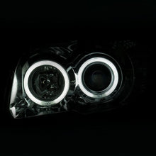 Load image into Gallery viewer, ANZO 2006-2009 Toyota 4Runner Projector Headlights w/ Halo Chrome - Corvette Realm