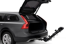 Load image into Gallery viewer, Thule Apex XT 4 - Hanging Hitch Bike Rack w/HitchSwitch Tilt-Down (Up to 4 Bikes) - Black - Corvette Realm