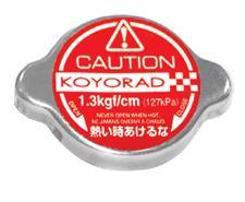 Radiator cap with Red circle featuring Caution and Koyorad text